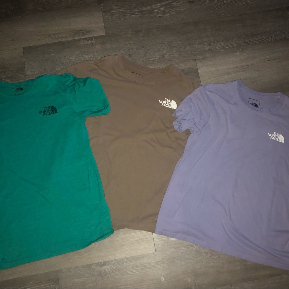 The North Face T- shirt’s Teal , Brown, and Lavender